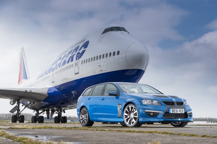 4K blue 2013 VXR8 Tourer Vauxhall next to Transaero Boeing 747