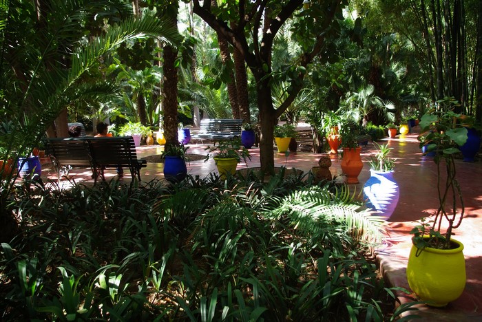 Jardin Majorelle Marrakech Morocco with colorful pots and benches