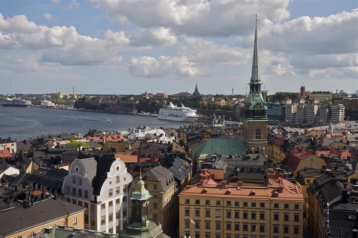 Stockholm cityscape with cruise ship and church spire