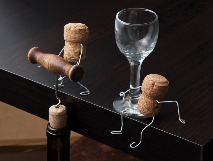 Cork figures with wine glass and corkscrew