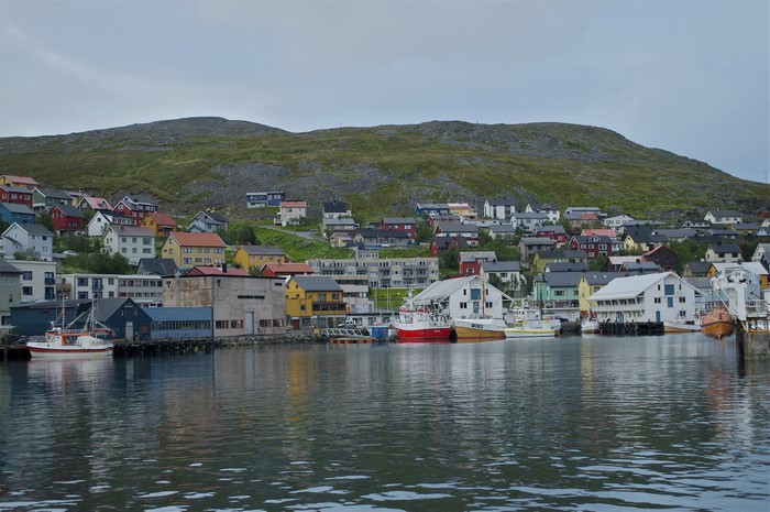 Colorful houses and boats in a Norwegian harbor