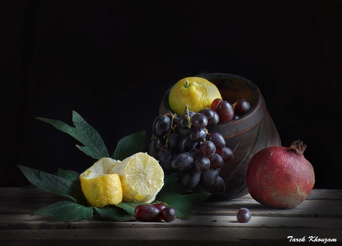 Still-life with grapes, lemons, and pomegranate