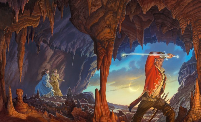 Man with sword in cave with two women