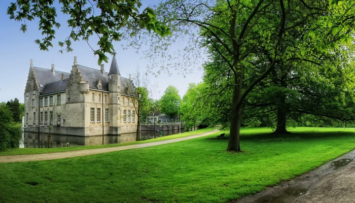 Cortewalle Castle in Belgium surrounded by a moat and park