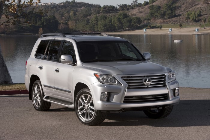 Silver 2012 Lexus LX 570 parked by a lake