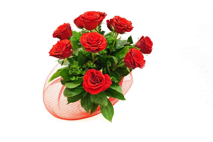 Bouquet of red roses with green leaves and red netting