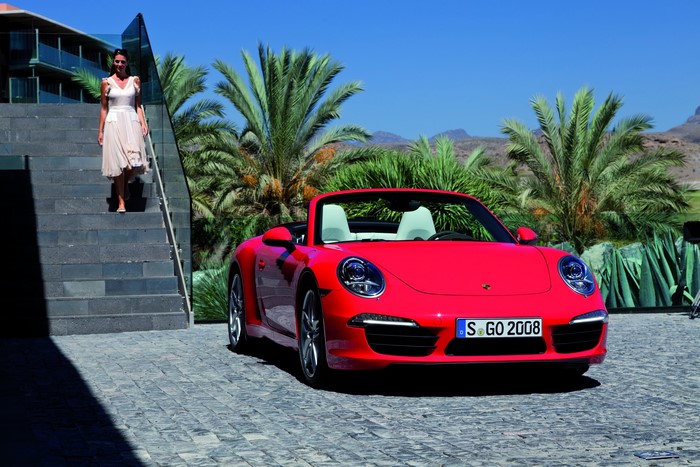 Red Porsche 911 Carrera S Cabriolet with Woman on Stairs