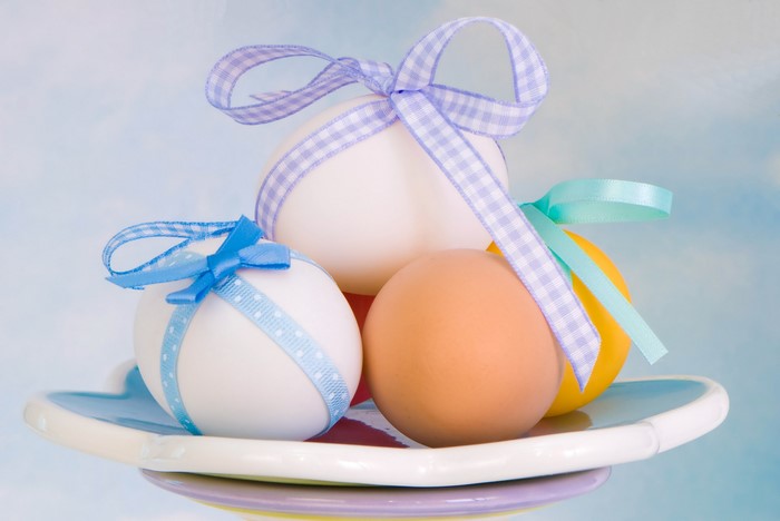 Easter Eggs with Ribbons on a Plate