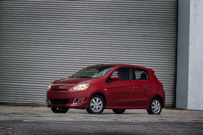 Red 2014 Mitsubishi Mirage ES parked