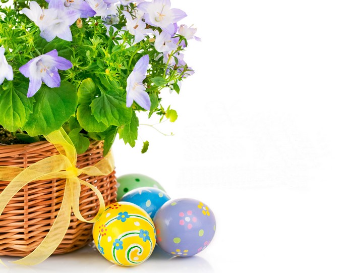 Easter Eggs and Flowers in Wicker Basket