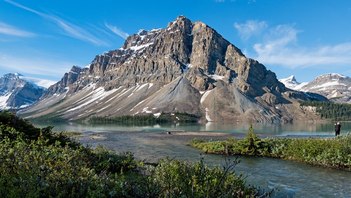 Mountain range with lake and trees in Banff National Park