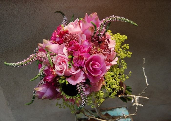 Pink and purple floral bouquet with green accents