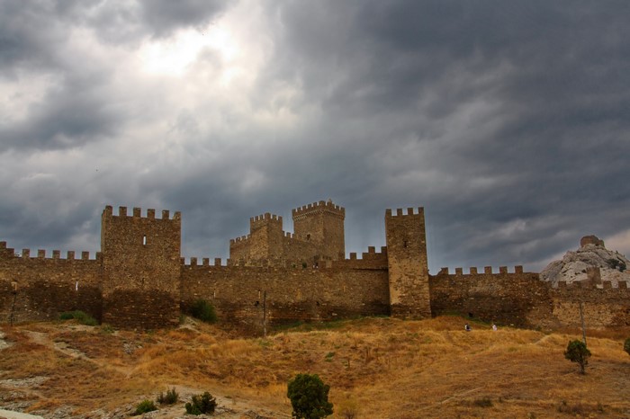 Genoese fortress under a stormy sky