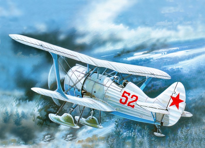 I-15 bis biplane flying over a winter landscape