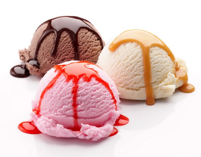 Three scoops of ice cream with toppings