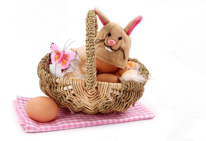 Easter basket with eggs and bunny hat