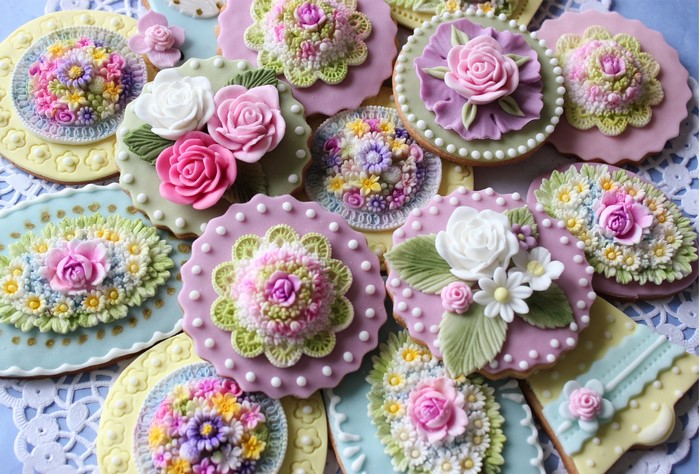 Decorated floral cookies with intricate icing designs