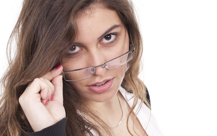Woman with brown hair wearing glasses