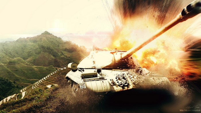 Tank firing in a mountainous landscape