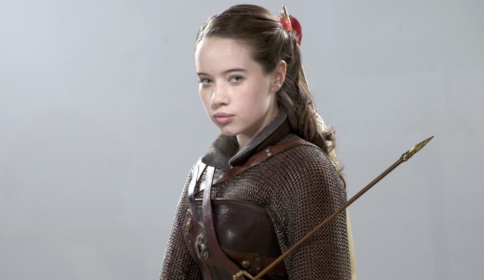Anna Popplewell in armor with a spear