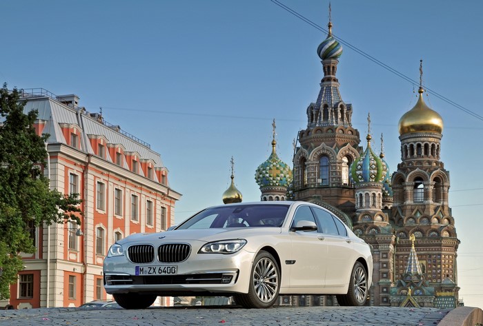 White BMW 750i F01 in front of St. Petersburg temples