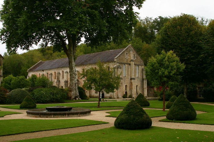 Abbaye de Fontenay, France, with formal gardens and fountain