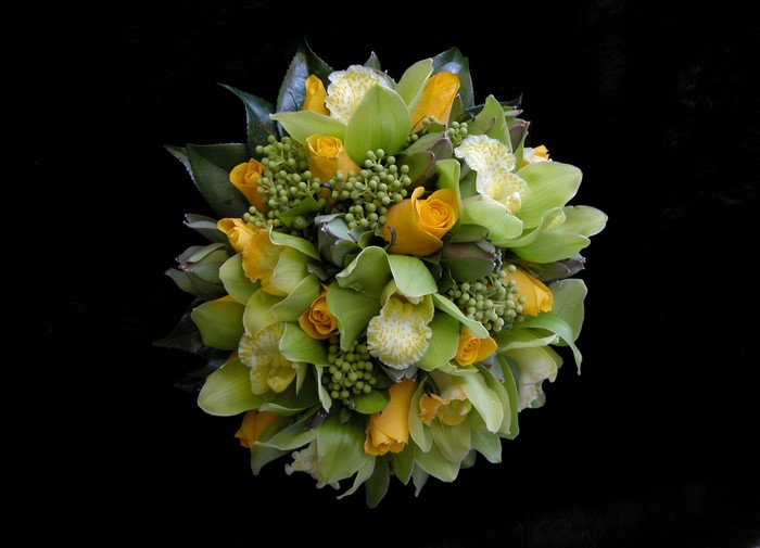 Yellow roses and green orchids bouquet