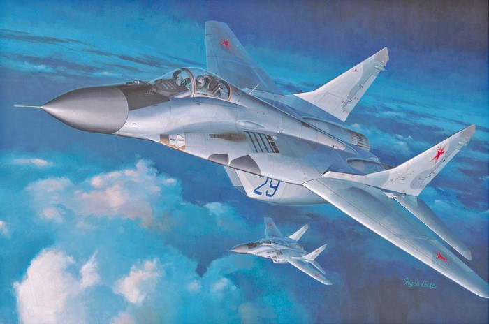 Two MiG-29 fighter jets flying in the sky
