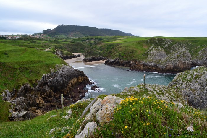Coastal landscape with cliffs and a beach in Cantabria, Spain