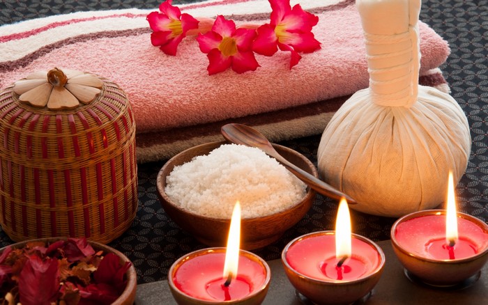 Spa items with candles and flowers