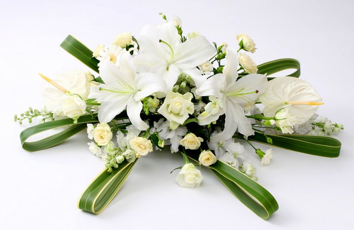White lilies and roses floral arrangement