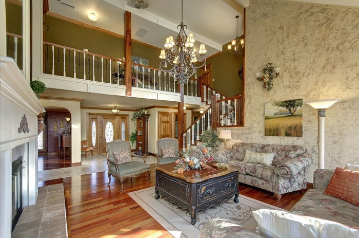 Living room with chandelier and sofa