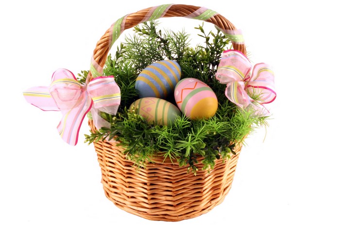 Easter basket with decorated eggs and bows