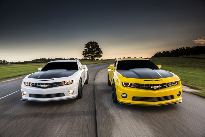 Two Chevrolet Camaros on a Road