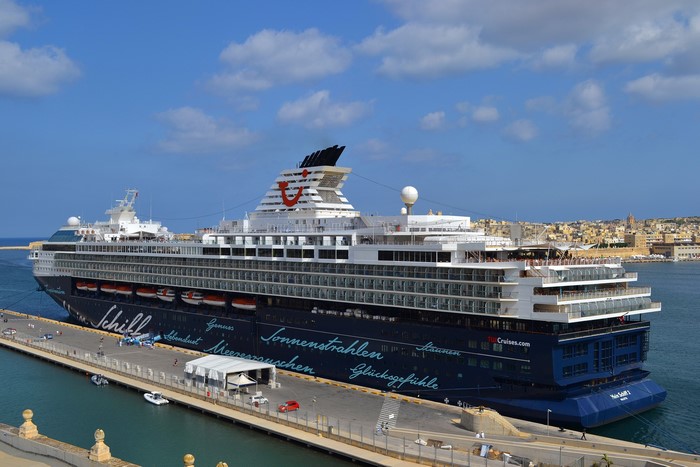 Mein Schiff cruise liner docked at a harbor