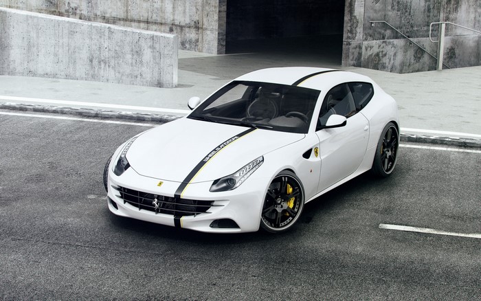 White Ferrari FF with racing stripes on asphalt