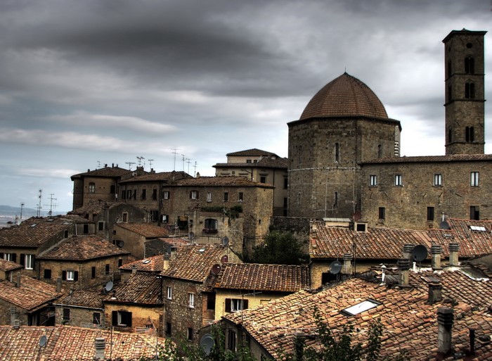 Volterra, Italy cityscape with ancient buildings and tiled roofs