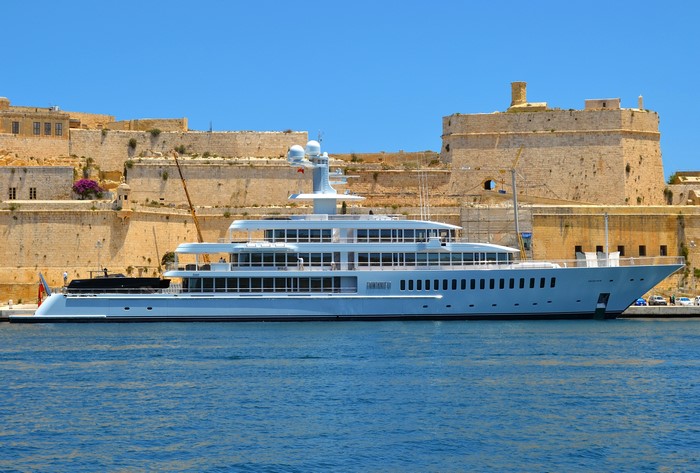 Fountainhead Yacht docked near historic fortifications