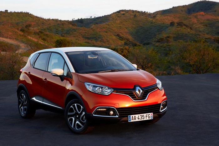 Orange Renault Captur parked outdoors