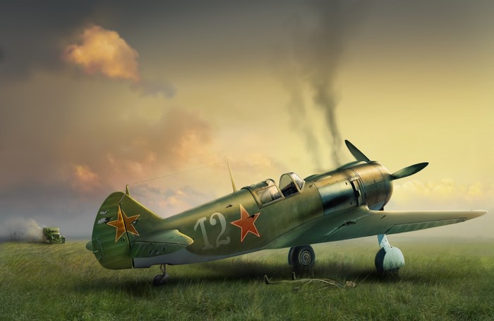 La-5 airplane in a field with smoke
