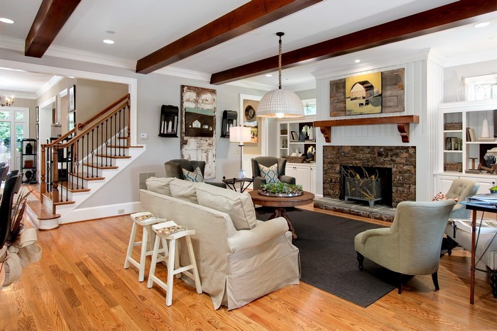 Living room with fireplace and stairs
