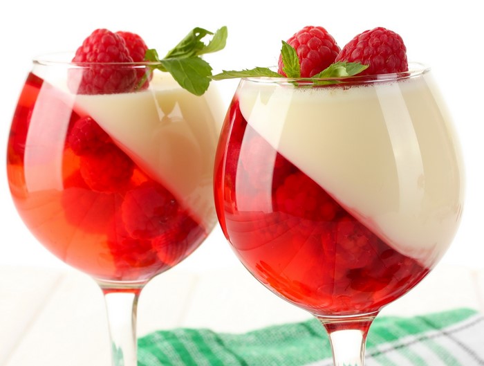Two glasses of raspberry and cream jelly dessert