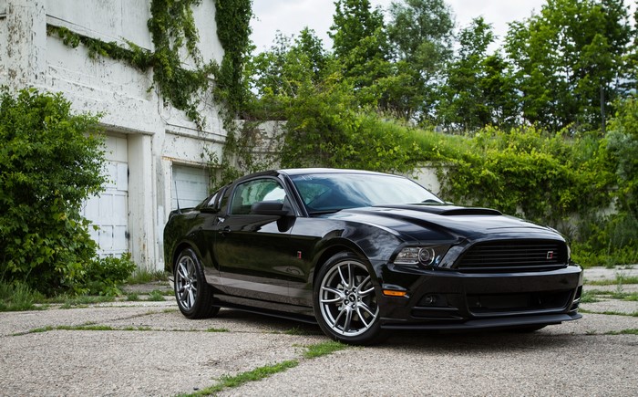 Black 2012 Ford Mustang RS parked outdoors