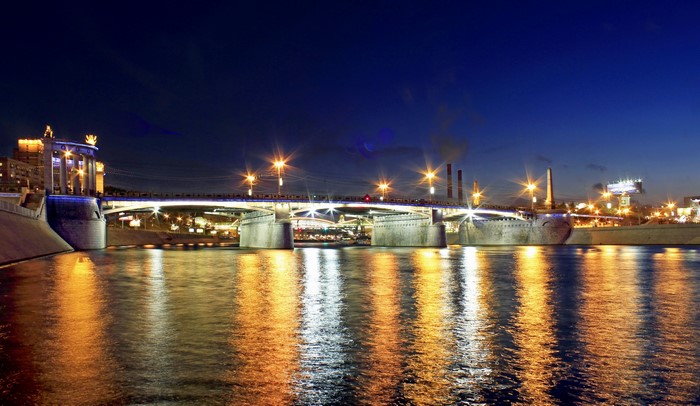 Bridge over river at night in Moscow, Russia