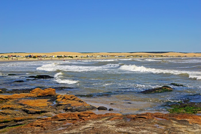 Beach with waves and dunes in Uruguay