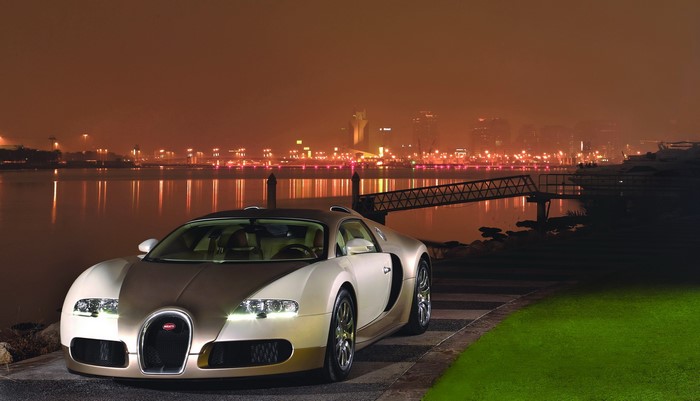 Bugatti Veyron Centenaire by a waterfront at night