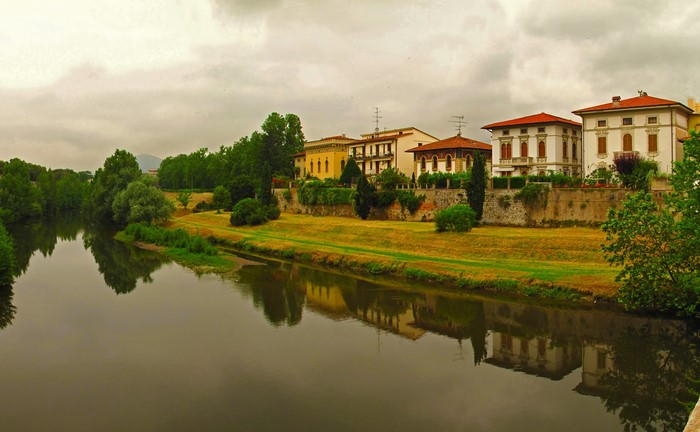 Houses on the Arno River in Prato, Tuscany, Italy