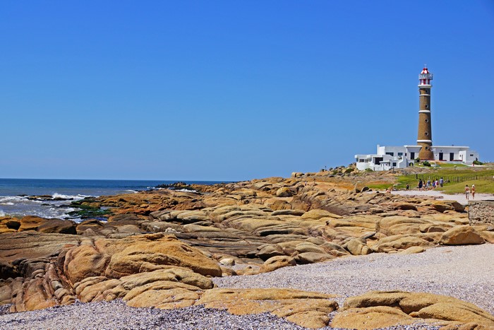 Lighthouse on rocky coast in Uruguay