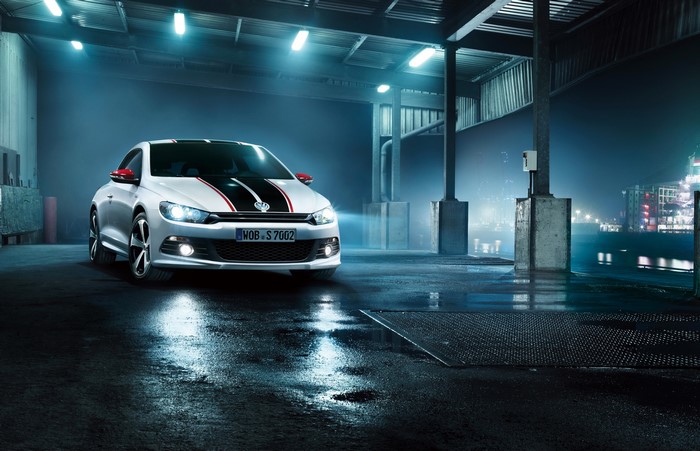 White Volkswagen Scirocco GTS with racing stripes