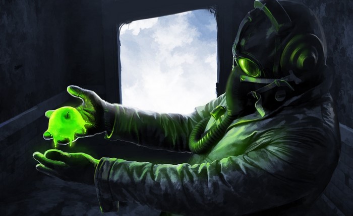 Man in gas mask holding glowing green substance
